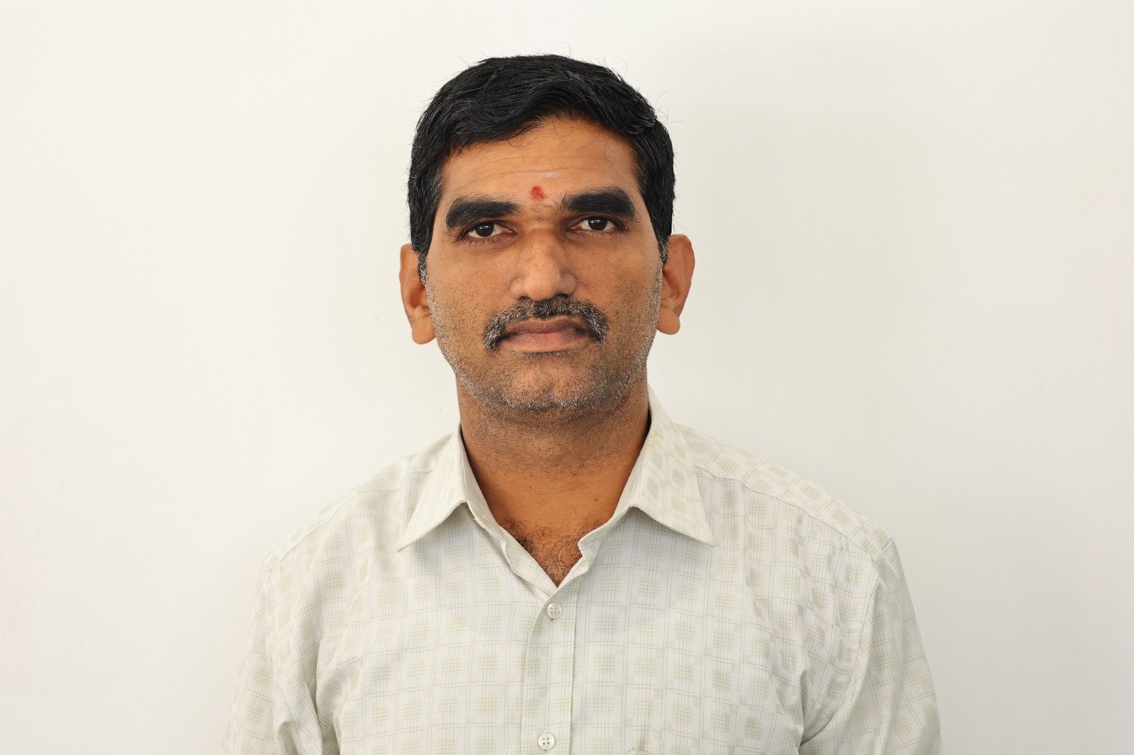 Prof. G. SRINIVASAN